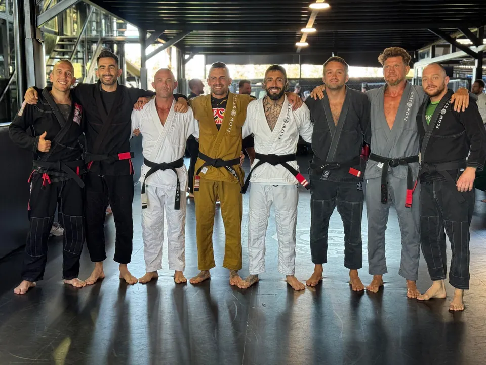The Flow Academy students gathered on the mat.